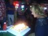 Happy birthday to Lisa ready to blow out the candles on her flowery cake, at Smitty McGee’s.